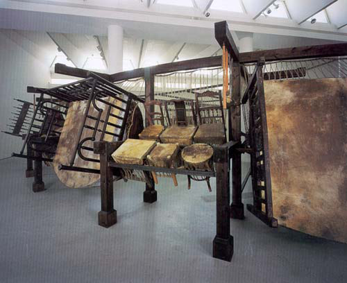 Chen Zhen-Jue Chang, Fifty Strokes to Each 1998 wood, iron, chairs, beds, skin,