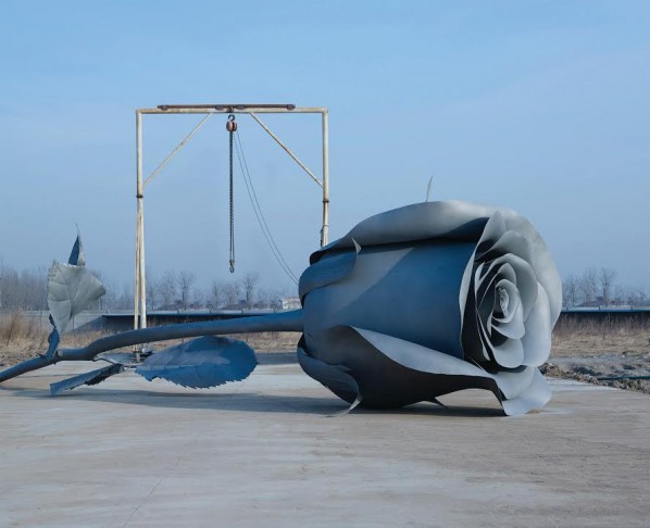 Cai Zhisong, Lying Rose, 2003; cast stainless steel, 250x250x800cm Courtesy of Cai Zhisong