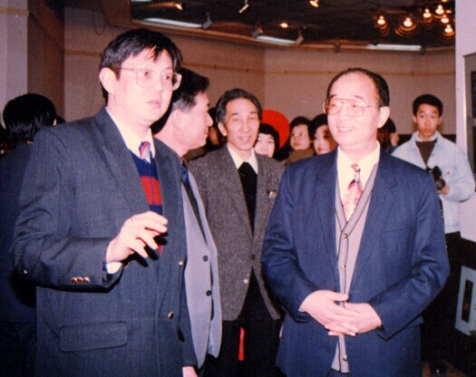 Professor Zhang Jun (left), GaoZhanxiang, Minister of the Department of Culture (right) and Jin Shangyi, President of CAFA at the 1993 Computer Art Exhibition